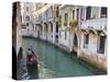 A Gondola on a Canal in Venice, UNESCO World Heritage Site. Veneto, Italy, Europe-Amanda Hall-Stretched Canvas