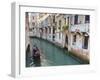 A Gondola on a Canal in Venice, UNESCO World Heritage Site. Veneto, Italy, Europe-Amanda Hall-Framed Photographic Print