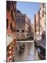 A Gondola on a Canal in Venice, UNESCO World Heritage Site, Veneto, Italy, Europe-null-Mounted Photographic Print
