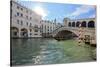 A gondolier rowing under Rialto Bridge in Venice, UNESCO World Heritage Site, Veneto, Italy, Europe-Nando Machado-Stretched Canvas