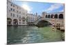 A gondolier rowing under Rialto Bridge in Venice, UNESCO World Heritage Site, Veneto, Italy, Europe-Nando Machado-Mounted Photographic Print