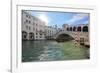 A gondolier rowing under Rialto Bridge in Venice, UNESCO World Heritage Site, Veneto, Italy, Europe-Nando Machado-Framed Photographic Print