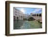 A gondolier rowing under Rialto Bridge in Venice, UNESCO World Heritage Site, Veneto, Italy, Europe-Nando Machado-Framed Photographic Print