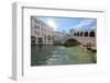 A gondolier rowing under Rialto Bridge in Venice, UNESCO World Heritage Site, Veneto, Italy, Europe-Nando Machado-Framed Photographic Print