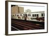 A Graffiti Painted Subway Train with Housing Projects in the Background, May 1973-null-Framed Photo