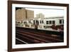 A Graffiti Painted Subway Train with Housing Projects in the Background, May 1973-null-Framed Photo