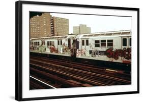 A Graffiti Painted Subway Train with Housing Projects in the Background, May 1973-null-Framed Photo