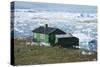 A Green House on the Shore with Icebergs in the Sea, Ilulissat, West Greenland-Natalie Tepper-Stretched Canvas