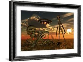 A Grey Alien Looking at Humanoid Remains as a Ufo Flys Overhead-Stocktrek Images-Framed Art Print