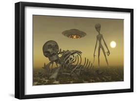 A Grey Alien Looking at Humanoid Remains as a Ufo Flys Overhead-Stocktrek Images-Framed Art Print