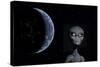 A Grey Alien with Planet Earth in the Background-null-Stretched Canvas