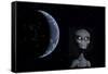 A Grey Alien with Planet Earth in the Background-null-Framed Stretched Canvas