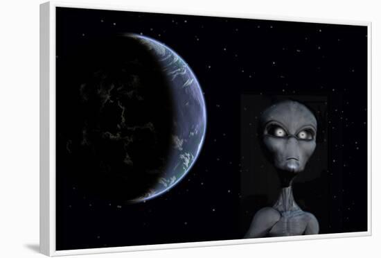 A Grey Alien with Planet Earth in the Background-null-Framed Art Print