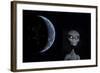 A Grey Alien with Planet Earth in the Background-null-Framed Art Print