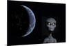 A Grey Alien with Planet Earth in the Background-null-Mounted Art Print