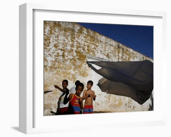 A Group of Children Fly Plastic Bags, Known as Papalotes-Javier Galeano-Framed Photographic Print