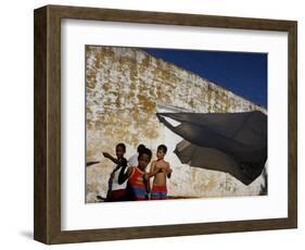 A Group of Children Fly Plastic Bags, Known as Papalotes-Javier Galeano-Framed Photographic Print