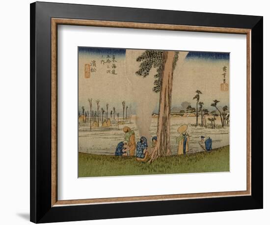 A Group of Clerks Warm Up by a Fire, in the Background Barren Rice Fields-Utagawa Hiroshige-Framed Art Print