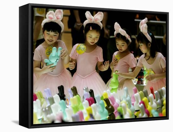 A Group of Girls Dressing as Bunny Rabbits Play with Rabbit Figures-null-Framed Stretched Canvas