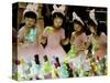 A Group of Girls Dressing as Bunny Rabbits Play with Rabbit Figures-null-Stretched Canvas