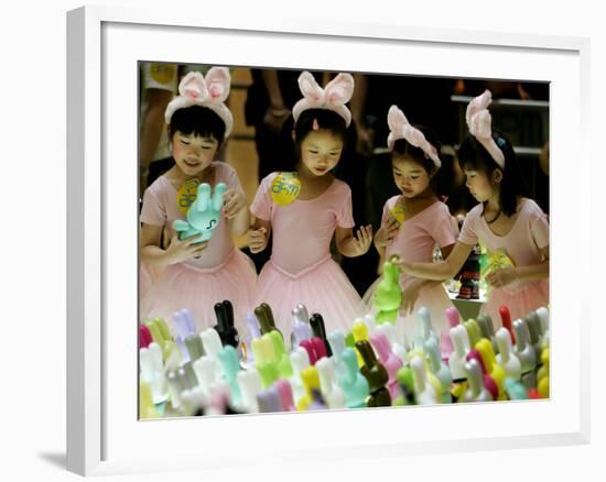 A Group of Girls Dressing as Bunny Rabbits Play with Rabbit Figures-null-Framed Photographic Print