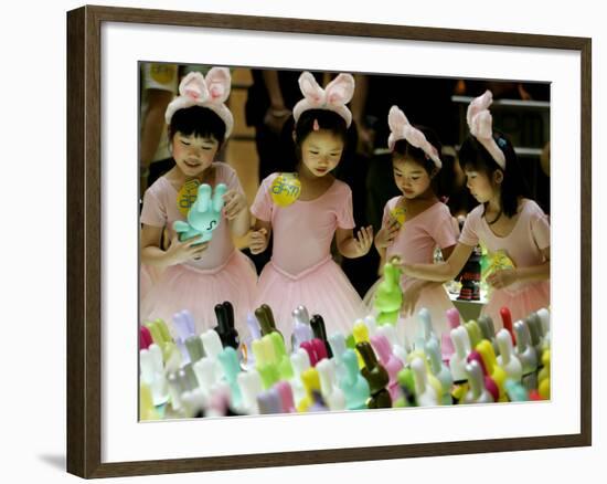 A Group of Girls Dressing as Bunny Rabbits Play with Rabbit Figures-null-Framed Photographic Print