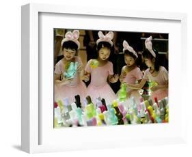 A Group of Girls Dressing as Bunny Rabbits Play with Rabbit Figures-null-Framed Photographic Print