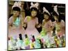 A Group of Girls Dressing as Bunny Rabbits Play with Rabbit Figures-null-Mounted Photographic Print