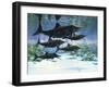 A Group of Ichthyosaurs Swimming in Prehistoric Waters-null-Framed Art Print