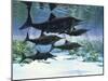 A Group of Ichthyosaurs Swimming in Prehistoric Waters-null-Mounted Art Print