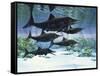 A Group of Ichthyosaurs Swimming in Prehistoric Waters-null-Framed Stretched Canvas