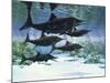 A Group of Ichthyosaurs Swimming in Prehistoric Waters-null-Mounted Art Print