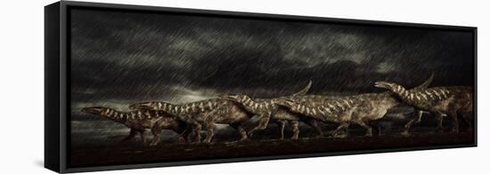A Group of Iguanodons Struggle Through a Storm-null-Framed Stretched Canvas