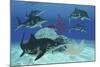 A Group of Large Ichthyosaurus Marine Reptiles Swimming in Prehistoric Waters-null-Mounted Art Print