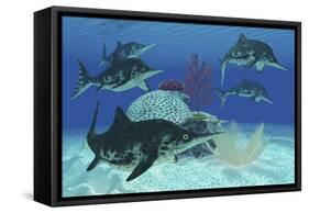 A Group of Large Ichthyosaurus Marine Reptiles Swimming in Prehistoric Waters-null-Framed Stretched Canvas