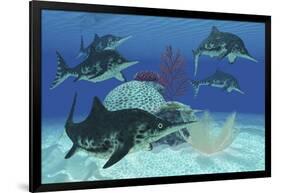 A Group of Large Ichthyosaurus Marine Reptiles Swimming in Prehistoric Waters-null-Framed Art Print