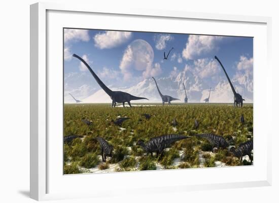 A Group of Sauropod and Hadrosaur Dinosaur Herds Grazing-null-Framed Art Print