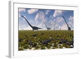 A Group of Sauropod and Hadrosaur Dinosaur Herds Grazing-null-Framed Art Print