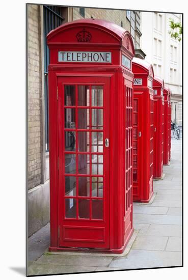 A Group of Typical Red London Phone Cabins-Kamira-Mounted Photographic Print