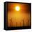 A Group of Wind Turbines are Silhouetted by the Setting Sun-Charlie Riedel-Framed Stretched Canvas