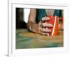 A Hand Holding a Red Mug-Katrin Adam-Framed Photographic Print