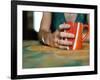 A Hand Holding a Red Mug-Katrin Adam-Framed Photographic Print