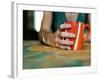 A Hand Holding a Red Mug-Katrin Adam-Framed Photographic Print