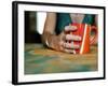 A Hand Holding a Red Mug-Katrin Adam-Framed Photographic Print