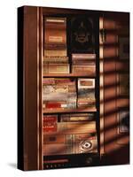 A Hand Made Cedar Armoire Containing Boxed Cigars-null-Stretched Canvas