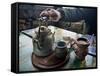 A Hand on a Teapot and Yerba Mate at Refugio Piltriquitron in the Andes of Patagonia, Argentina-Maureen Eversgerd-Framed Stretched Canvas