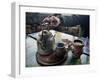 A Hand on a Teapot and Yerba Mate at Refugio Piltriquitron in the Andes of Patagonia, Argentina-Maureen Eversgerd-Framed Photographic Print