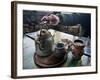 A Hand on a Teapot and Yerba Mate at Refugio Piltriquitron in the Andes of Patagonia, Argentina-Maureen Eversgerd-Framed Photographic Print