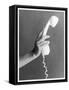 A Hand with Manicured Finger Nails Hold Up a White Telephone Handset-null-Framed Stretched Canvas