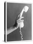 A Hand with Manicured Finger Nails Hold Up a White Telephone Handset-null-Stretched Canvas